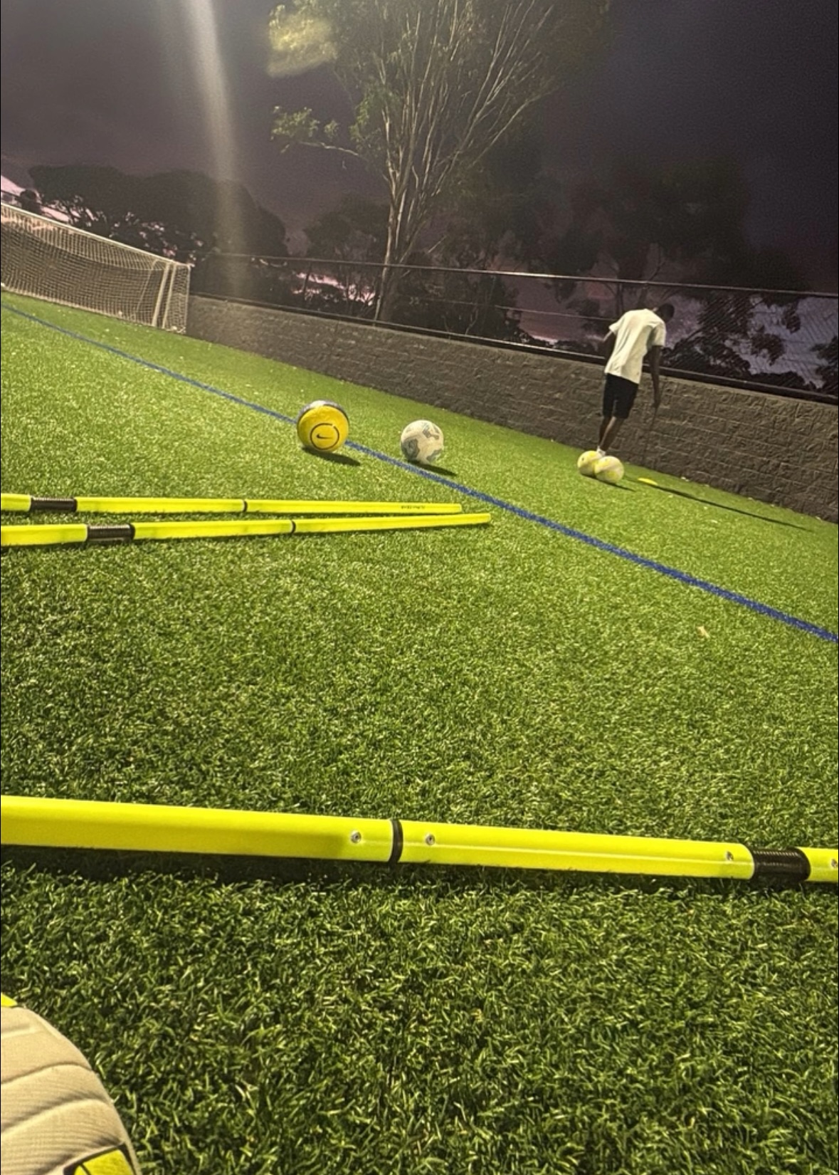 La Academia football training session at night